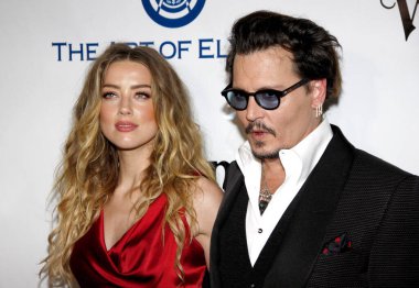 Amber Heard ve Johnny Depp, 9 Ocak 2016 tarihinde ABD 'nin Culver City kentindeki 3LABS' te düzenlenen Elysium 'un 9.. 
