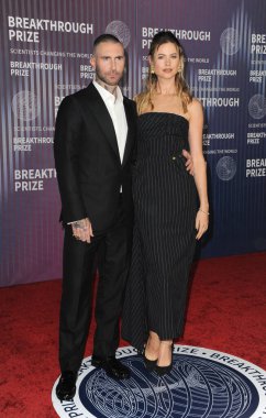 Behati Prinsloo and Adam Levine at the 10th Annual Breakthrough Prize Ceremony held at the Academy Museum of Motion Pictures in Los Angeles, USA on April 13, 2024. clipart