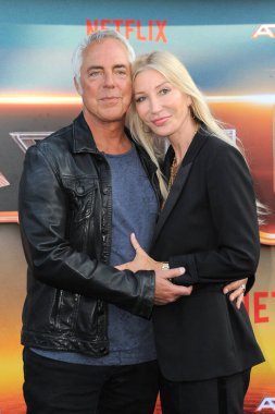 Titus Welliver and Samantha Edge at the Los Angeles premiere of Netflix's 'Atlas' held at the Egyptian Theatre in Hollywood, USA on May 20, 2024. clipart