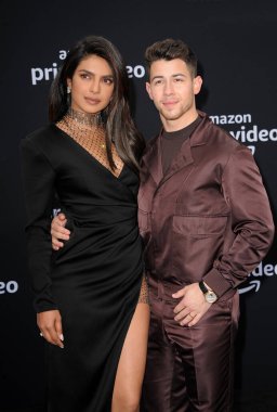 Nick Jonas and Priyanka Chopra at the premiere of Amazon Prime Video's 'Chasing Happiness' held at the Regency Bruin Theatre in Westwood, USA on June 3, 2019. clipart