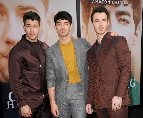 stock image Kevin Jonas, Joe Jonas and Nick Jonas at the premiere of Amazon Prime Video's 'Chasing Happiness' held at the Regency Bruin Theatre in Westwood, USA on June 3, 2019.