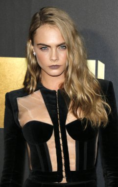 9 Nisan 2016 yılında Warner Bros. Studios Burbank, ABD Cara Delevingne 2016 Mtv Film Ödülleri'nde düzenlenen.