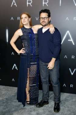 Amy Adams and J.J. Abrams at the Los Angeles premiere of 'Arrival' held at the Regency Village Theater in Westwood, USA on November 6, 2016. clipart