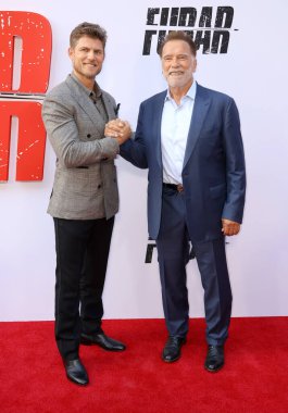 Travis Van Winkle ve Arnold Schwarzenegger Netflix 'in' Fubar 'ikinci sezon galasında 11 Haziran 2025' te Hollywood, ABD 'deki Tudum Tiyatrosu' nda gerçekleştirildi..
