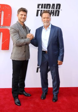 Travis Van Winkle ve Arnold Schwarzenegger Netflix 'in' Fubar 'ikinci sezon galasında 11 Haziran 2025' te Hollywood, ABD 'deki Tudum Tiyatrosu' nda gerçekleştirildi..