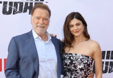 Arnold Schwarzenegger ve Monica Barbaro Netflix 'in' Fubar '2. sezon galasında 11 Haziran 2025' te Hollywood, ABD 'deki Tudum Tiyatrosu' nda gerçekleştirildi..