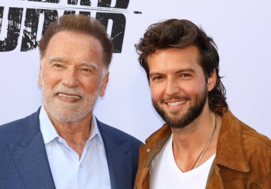 Arnold Schwarzenegger ve Guy Burnet Netflix 'in' Fubar '2. sezon galasında 11 Haziran 2025' te Hollywood, ABD 'deki Tudum Tiyatrosu' nda gerçekleştirildi..