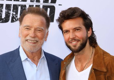 Arnold Schwarzenegger ve Guy Burnet Netflix 'in' Fubar '2. sezon galasında 11 Haziran 2025' te Hollywood, ABD 'deki Tudum Tiyatrosu' nda gerçekleştirildi..