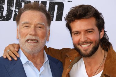 Arnold Schwarzenegger ve Guy Burnet Netflix 'in' Fubar '2. sezon galasında 11 Haziran 2025' te Hollywood, ABD 'deki Tudum Tiyatrosu' nda gerçekleştirildi..