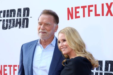 Arnold Schwarzenegger ve Heather Milligan Netflix 'in' Fubar '2. sezon galasında 11 Haziran 2025' te Hollywood, ABD 'deki Tudum Tiyatrosu' nda gerçekleştirildi..