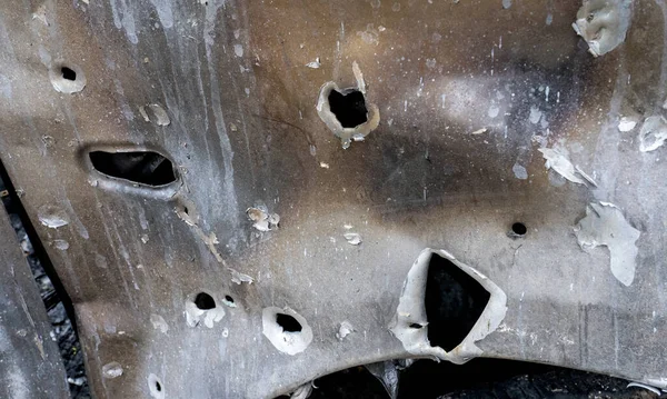stock image Bullet and shrapnel holes in the civilian transport hull after the biggest rocket attack on Kiev, the concept of Russia's war against Ukraine, background and texture