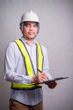 Engineer in uniform working in the studio