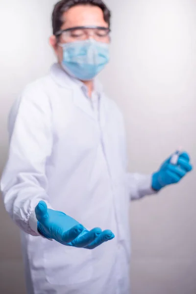 Doctor holding something in his hand. Healthcare Concept.