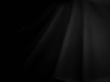 Perde ya da kumaş siyah dalga. İzole edilmiş ve kopyalanmış arkaplanda lüks soyut arkaplan