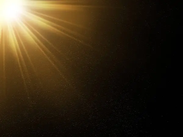 Yandan gelen turuncu güneş ışığı siyah arkaplanda toz etkisi yaratıyor