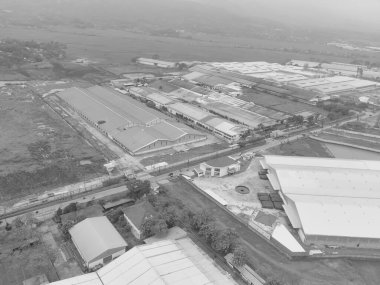 Black and white photo aerial view of textile industrial district in Cikancung area - Indonesia.