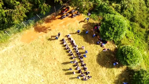 Aerial Footage Aerial View School Students Lining Gathering Edge Field — Stock Video