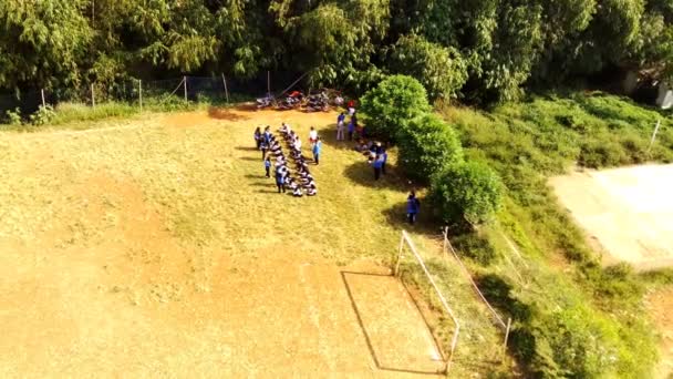 Aerial Footage Parallax Shot School Students Lining Gathering Edge Field — Stock Video