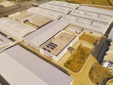 Sanayi fotoğrafçılığı. Havadan manzaralar. Rancaekek, Bandung-Endonezya 'daki Dwipapuri Endüstri Bölgesi' ndeki fabrikaların kuş bakışı görüntüsü. Uçan bir İHA 'dan havadan çekilmiş..