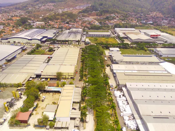 Industrial Photography. Aerial Landscapes. Bird eye view of Factories in the Dwipapuri Industrial Sector, Located in Rancaekek, Bandung - Indonesia. Aerial Shot from a flying drone.