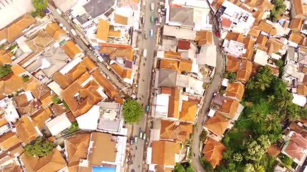 无人机的图像 从天空看印度尼西亚锡卡伦加市的时光飞逝 有购物中心 传统市场和城镇广场 这些地方被稠密的住宅区和一条主要道路挤得水泄不通 30Fps — 图库视频影像