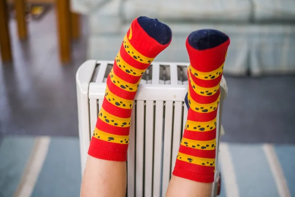 Kid Warming Legs Heating Radiator Colorful Socks Close Space Text — Stock Photo, Image