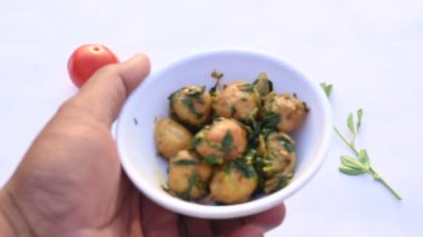 Aloo Methi or Fenugreek potato vegetable. It is made with fresh fenugreek leaves and potatoes. Indian homemade traditional Aalu Methi dry curry. Fenugreek potato sabzi  is healthy Indian Cuisine.