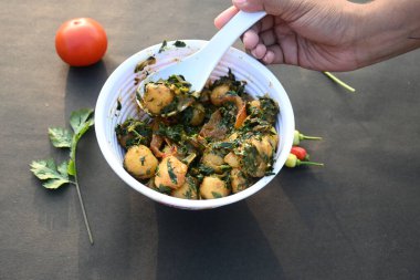 Aloo Methi or Fenugreek potato vegetable. It is made with fresh fenugreek leaves and potatoes. Indian homemade traditional Aalu Methi dry curry. Fenugreek potato sabzi  is healthy Indian Cuisine.