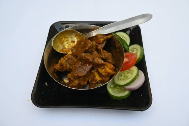 Geleneksel Hint keçi eti körisi. Hint usulü koyun eti çok lezzetlidir. Hint evinde baharatlı koyun eti. Lezzetli Keçi eti. 