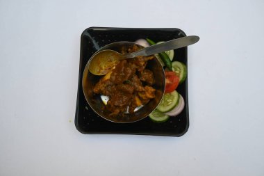 Geleneksel Hint keçi eti körisi. Hint usulü koyun eti çok lezzetlidir. Hint evinde baharatlı koyun eti. Lezzetli Keçi eti. 