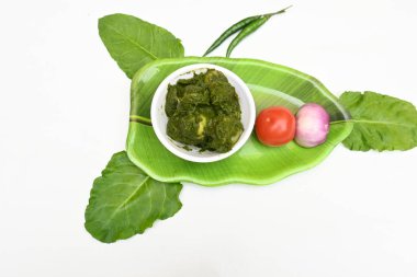 Hint ıspanağı ve patates körisi. Ispanaklı ve patatesli Hint sebzeli köri. Hint usulü kızarmış patates ve ıspanaktan yapılmış kuru bir tabak.. 