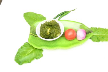 Hint ıspanağı ve patates körisi. Ispanaklı ve patatesli Hint sebzeli köri. Hint usulü kızarmış patates ve ıspanaktan yapılmış kuru bir tabak.. 