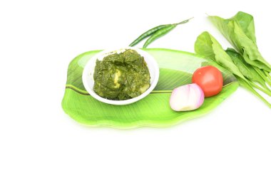 Hint ıspanağı ve patates körisi. Ispanaklı ve patatesli Hint sebzeli köri. Hint usulü kızarmış patates ve ıspanaktan yapılmış kuru bir tabak.. 