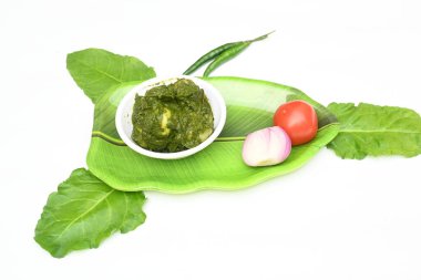 Hint ıspanağı ve patates körisi. Ispanaklı ve patatesli Hint sebzeli köri. Hint usulü kızarmış patates ve ıspanaktan yapılmış kuru bir tabak.. 