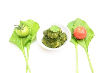 Hint ıspanağı ve patates körisi. Ispanaklı ve patatesli Hint sebzeli köri. Hint usulü kızarmış patates ve ıspanaktan yapılmış kuru bir tabak.. 