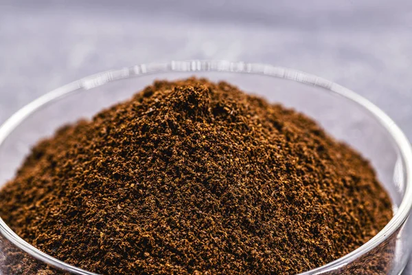 high quality coffee powder in petri dish, bio engineering laboratory white background, transgenic coffee research