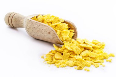 Flaked and ground cornmeal, culinary ingredient of the traditional food called Couscous, Brazillian tipical food