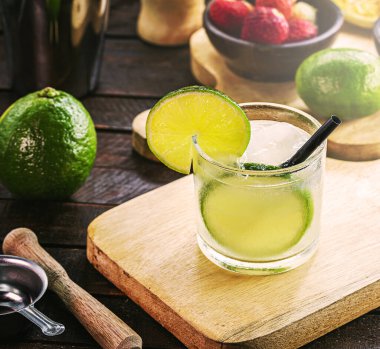 Brazilian caipirinha, typical Brazilian cocktail made with lemon, cachaca and sugar. Cultural and gastronomic heritage of Rio de Janeiro. Drink symbol of Brazil.