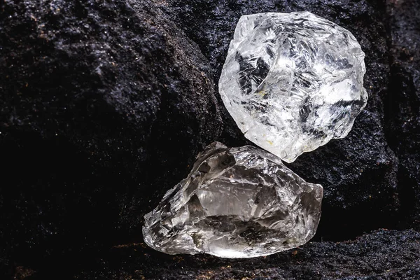 Rough diamond, precious stone in mines. Concept of mining and extraction of rare ores , macro photography