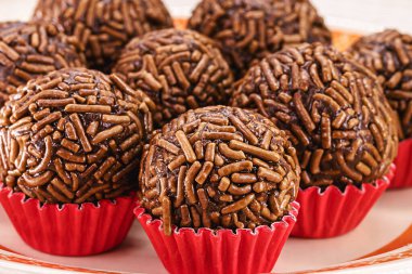 Brazilian children's party candy, brigadeiro, truffle or chocolate candy made with condensed milk and granulated chocolate, children's party candy