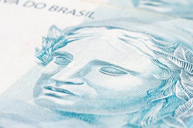 Brezilya 'dan gelen 100 reais banknotunun ayrıntıları, seçici bir odak noktası, parasal konsept için arka plan resmi. Brezilya 'daki mali kriz ya da finansal iş.