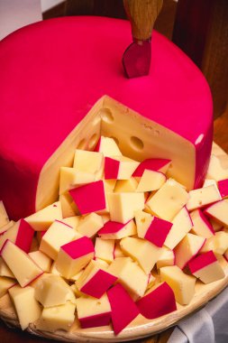 gorgonzola cheese, served on a wooden board, serra da canasta cheese, typical Brazilian food, party appetizer clipart