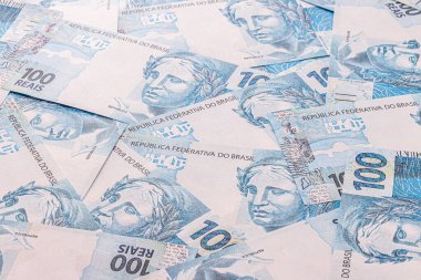 100 Brazilian real banknotes, one hundred real notes, Brazilian money, background, texture