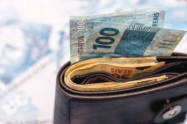 wallet with money, payment, banknotes and notes from Brazil, concept of payment, savings, prize