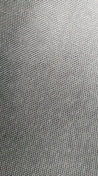 Örülmüş kahverengi kumaş ipliklerinin arkaplan dokusu