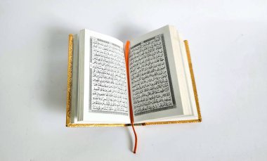 The Koran (Quran) is open with Arabic text ready to be read, suitable for Ramadan and Islamic life themes
