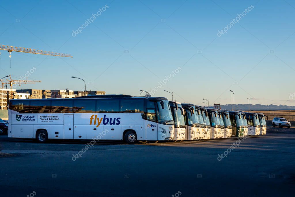 Reykjavik, Iceland - March 15, 2023: A row of buses of Flybus Iceland bus company at BSI bus station.