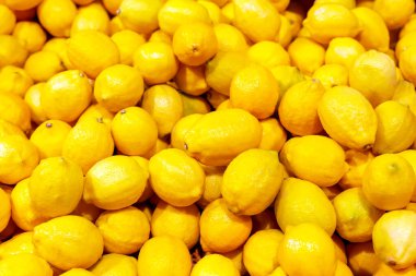 Bir sürü taze limon. Tasarımınız için limon arkaplanı
