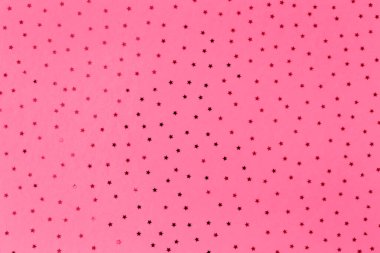 Eflatun arkaplandaki küçük yıldızların deseni. Seçici odaklanma. 2023 Yılı Rengi