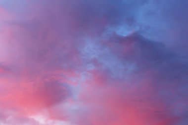 Pink clouds on the blue sky from the sunset